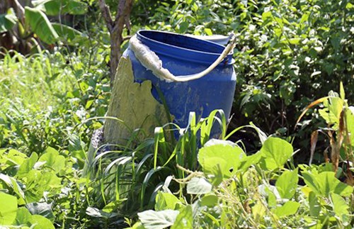 Bồn nhựa nơi Thành phi tang xác ông Linh. Ảnh: Phước Tuấn
