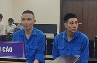 2 trong số các bị cáo tại tòa. Ảnh: HM.