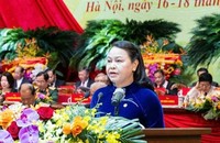 Ủy viên Trung ương Đảng, Phó Chủ tịch - Tổng Thư ký UBTƯ MTTQ Việt Nam khóa IX Nguyễn Thị Thu Hà trình bày Báo cáo chính trị tại Đại hội. Ảnh: PV