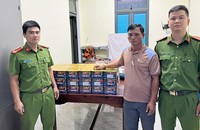 Đối tượng Nguyễn Văn Hải cùng tang vật. (Ảnh T.T)