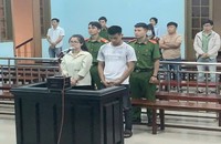 Bị cáo Nguyễn Thị Ngọc Trâm và Nguyễn Xuân Tình tại phiên tòa.