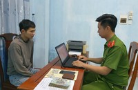 Đối tượng Võ Quốc Hải cùng tang vật.