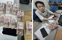 Đối tượng Trương Minh Ngọc và tang vật tiền giả. (Ảnh: Công an cung cấp)