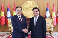 Tổng Bí thư, Chủ tịch nước Lào và Chủ tịch Quốc hội Trần Thanh Mẫn. (Ảnh: Thống Nhất/TTXVN)