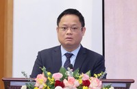Phó Chủ nhiệm Văn phòng Quốc hội Vũ Minh Tuấn thông tin tại họp báo.