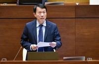Bộ trưởng Bộ Công an Lương Tam Quang trình bày tờ trình tại phiên họp.