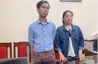 Nguyễn Quang Vũ và Zhang Min khi bị bắt giữ. (Ảnh: Công an cung cấp)