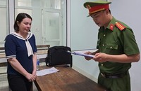 Lê Thị Thư tại cơ quan công an