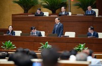 Phó Thủ tướng Lê Minh Khái báo cáo giải trình trước Quốc hội vào hôm qua - 8/6. Ảnh quochoi.vn