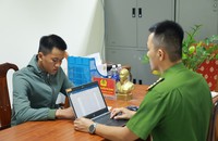 Nguyễn Công Quốc tại cơ quan Công an.