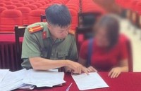 Chị T.T.V.A tại cơ quan Công an. Ảnh: Công an TP Hà Nội