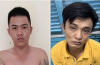 Đối tượng Dương Thanh Lành và Phạm Thế Vinh (phải) tại cơ quan Công an