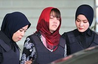 Đoàn Thị Hương rời tòa ngày 14/3.