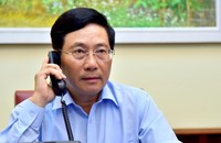 Phó Thủ tướng, Bộ trưởng Ngoại giao Phạm Bình Minh điện đàm với Bộ trưởng Ngoại giao Canada Francois-Philippe Champagne. Ảnh: BNG