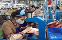 Nghị quyết số 68/NQ-CP sẽ giúp doanh nghiệp và NLĐ giảm bớt khó khăn do ảnh hưởng của dịch COVID-19. Ảnh minh họa