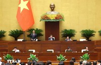 Phó Chủ tịch Quốc hội Trần Quang Phương điều hành nội dung cuộc họp sáng 21/5. (Ảnh: TTXVN).