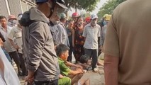 Quý bị cảnh sát khống chế sau khi gây ra vụ chém người. Ảnh:cắt từ clip.