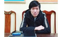 Trần Kim Hùng cùng chiếc laptop chuyên cày game và hack facebook để lừa đảo chiếm đoạt tài sản.