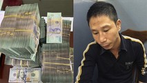 Đối tượng cầm đầu đường dây Hoàng Lại Nam (tức Nam "ngọ") và tang vật thu giữ.
