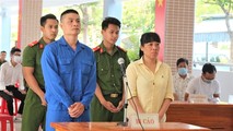 2 bị cáo Long và Thủy tại phiên tòa xét xử lưu động.