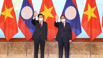 Thủ tướng Chính phủ Phạm Minh Chính và Tổng Bí thư, Chủ tịch nước Lào Thongloun Sisoulith.