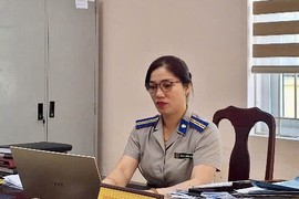 Chấp hành viên Trần Thị Hồng Liên, Phòng Nghiệp vụ và Tổ chức THA - Cục THADS tỉnh Tuyên Quang (Ảnh: Lê Hanh)