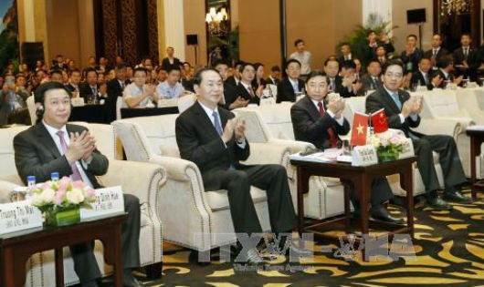 Chủ tịch nước tới dự Tọa đàm Hợp tác kinh tế - thương mại Việt Nam - Trung Quốc (tỉnh Phúc Kiến) tại thành phố Phúc Châu. Ảnh: TTXVN