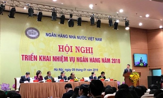 Thống đốc Lê Minh Hưng phát biểu tại Hội nghị. (Ảnh: TH/Vietnam+)