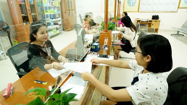 Cải cách TTHC nhằm tạo thuận lợi tối đa cho người tham gia và thụ hưởng chính sách BHXH, BHYT. Ảnh minh họa