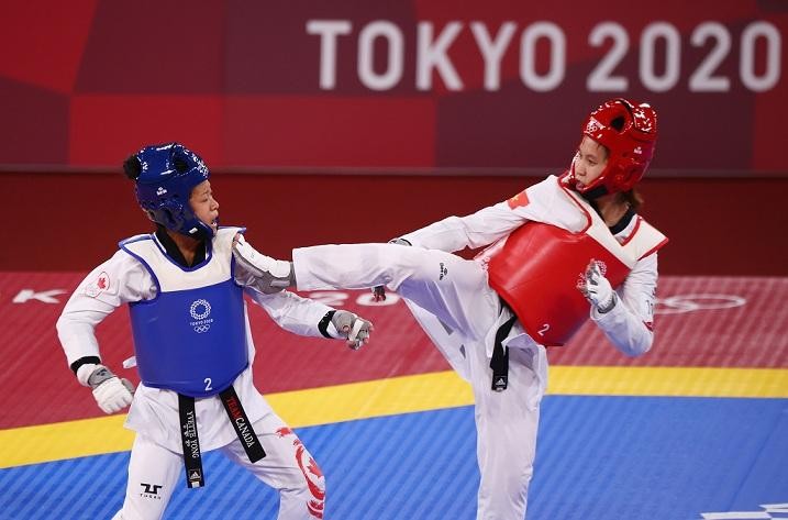 Trương Thị Kim Tuyền giành chiến thắng cách biệt ở vòng 1/8. (Ảnh: Reuters)