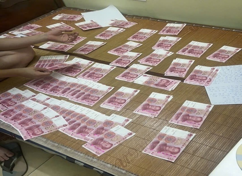 Quảng Ninh: Bắt giữ 2 đối tượng người nước ngoài tàng trữ, lưu hành tiền giả ảnh 1