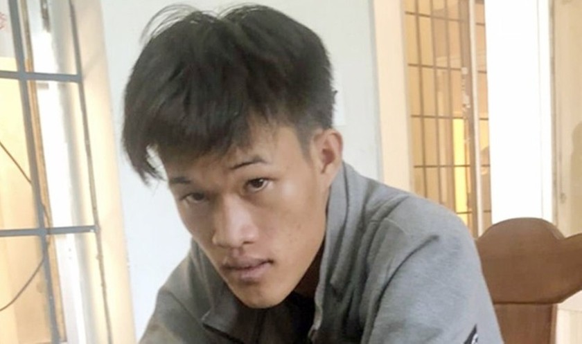 Phạm Kim Phê sau khi bị bắt.