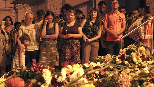 Lễ truy điệu các nạn nhân xấu số trong chuyến bay MH17. Ảnh Reuters