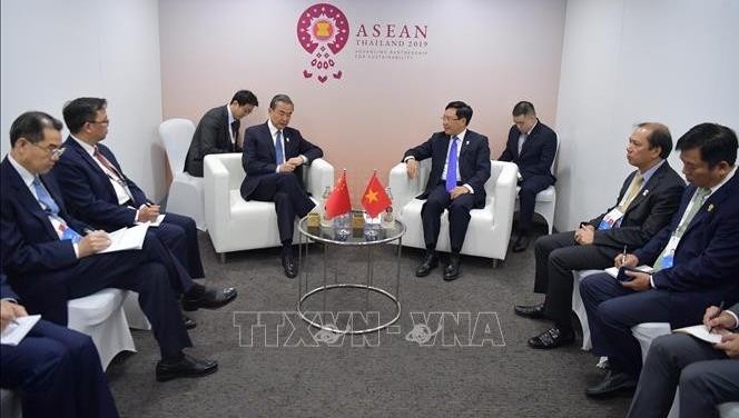 Phó Thủ tướng Bộ trưởng Phạm Bình Minh gặp Uỷ viên Quốc vụ, Bộ trưởng Ngoại giao Trung Quốc Vương Nghị. Ảnh: TTX