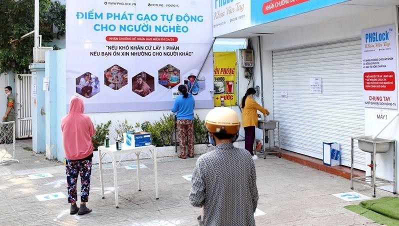 "ATM gạo", phát gạo tự động miễn phí trên Reuters.