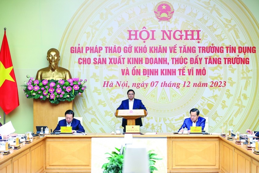 Thủ tướng Chính phủ Phạm Minh Chính phát biểu tại Hội nghị Giải pháp tháo gỡ khó khăn về tăng trưởng tín dụng cho sản xuất kinh doanh, thúc đẩy tăng trưởng và ổn định kinh tế vĩ mô. (Nguồn ảnh: chinhphu.vn).
