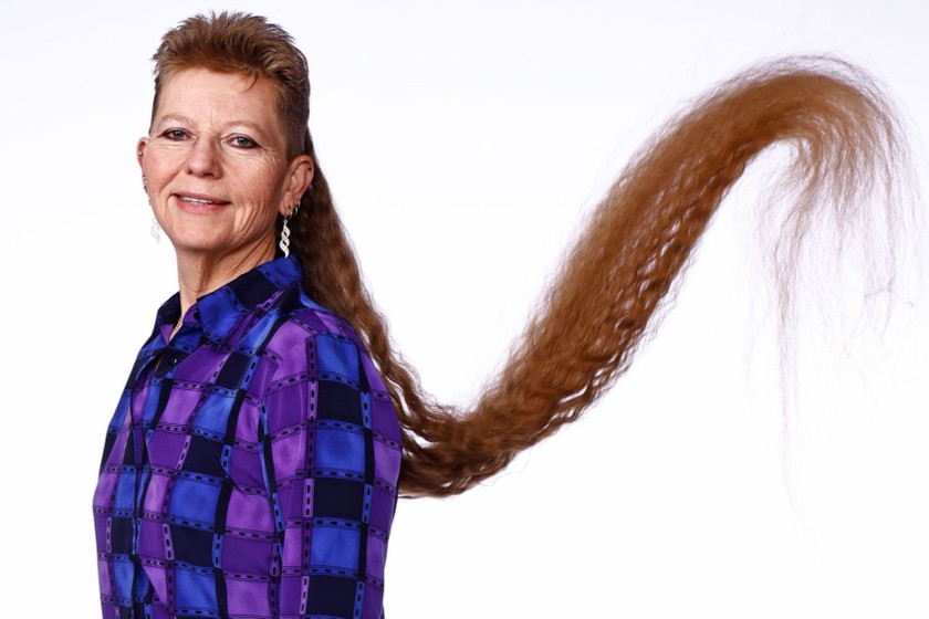 Tami Manis có mái tóc mullet dài nhất thế giới với chiều dài 173 cm. Ảnh: CNN.