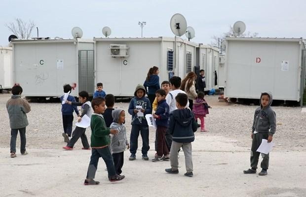 Trẻ em nhập cư tại một trại tị nạn dưới nhiệm kỳ của cựu Tổng thống Donald Trump. (Ảnh: AFP/TTXVN)
