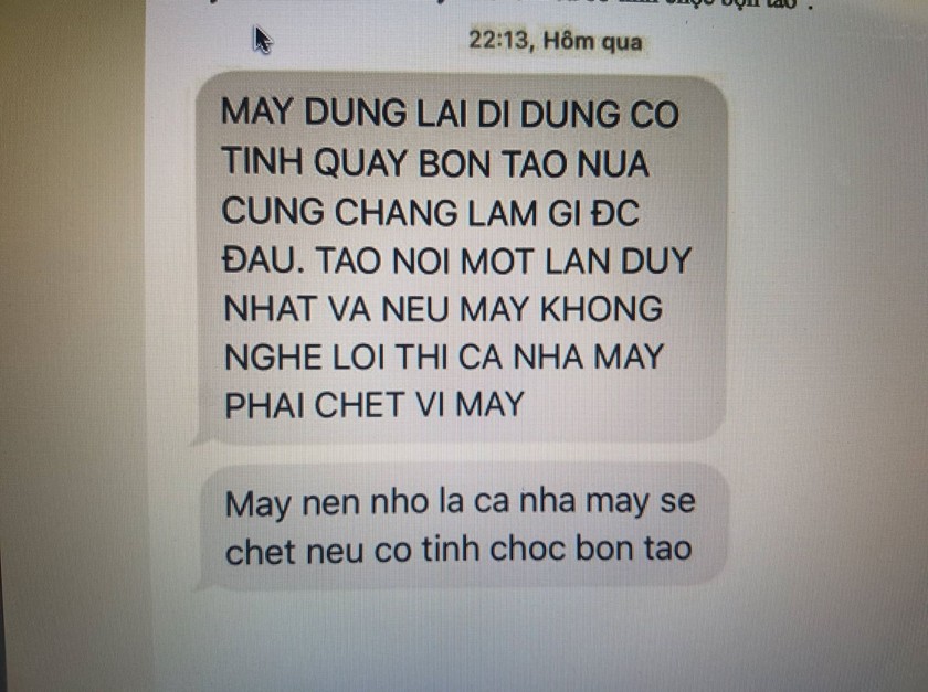 Tin nhắn đe dọa 2 phóng viên.