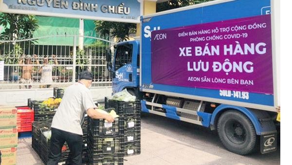  Điểm bán hàng lưu động do một siêu thị tổ chức nhằm giảm bớt tình trạng xếp hàng, tập trung đông tại siêu thị.