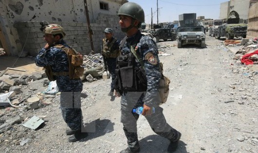 Lực lượng Iraq tuần tra tại Mosul. (Ảnh: AFP/TTXVN)