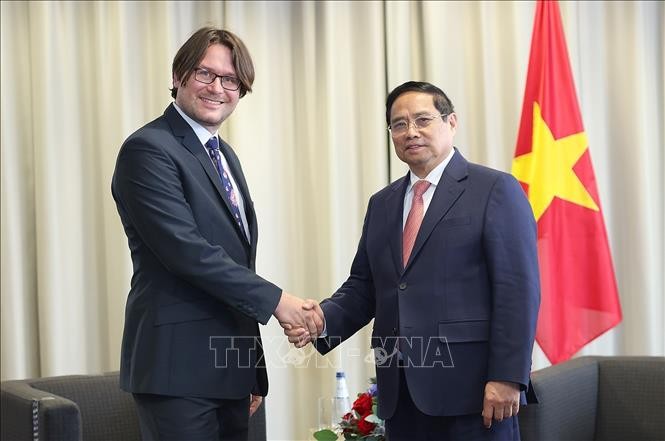 Thủ tướng Phạm Minh Chính tiếp ông Jevgeni Kabanov, Chủ tịch Tập đoàn Bolt - tập đoàn công nghệ chuyên về di chuyển và giao hàng tiêu biểu của Estonia. Ảnh: Dương Giang/TTXVN