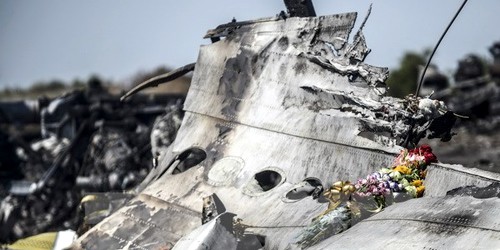 Xác máy bay MH17 gần làng Grabove, vùng Donetsk, miền Đông Ukraine ngày 26/7/2014. (Nguồn: AFP/TTXVN)