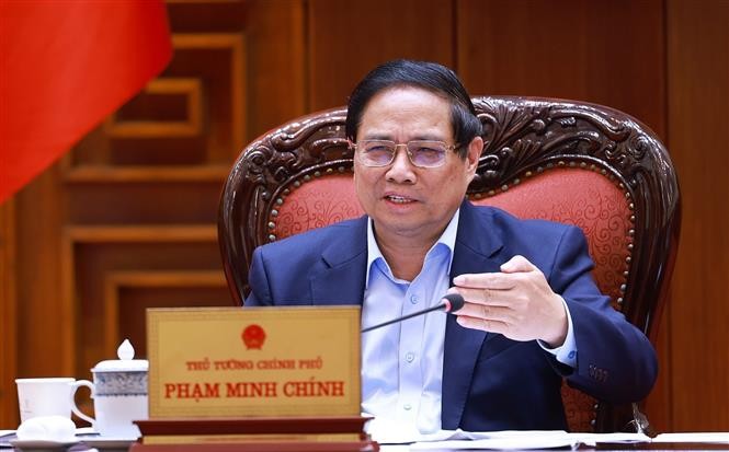 Thủ tướng Phạm Minh Chính chủ trì cuộc họp Thường trực Chính phủ về trung tâm tài chính quốc tế tại TP Hồ Chí Minh và Đà Nẵng. Ảnh: Dương Giang/TTXVN