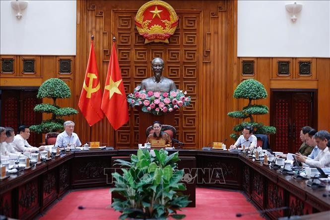 Thủ tướng Phạm Minh Chính chủ trì cuộc họp về Trung tâm tài chính quốc tế tại Việt Nam. Ảnh: Dương Giang/TTXVN
