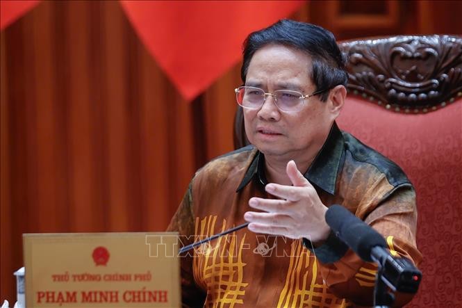 Thủ tướng Phạm Minh Chính chủ trì cuộc họp về Trung tâm tài chính quốc tế tại Việt Nam. Ảnh: Dương Giang/TTXVN