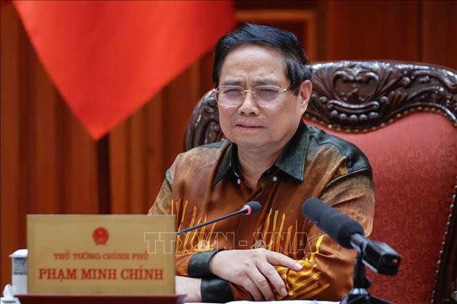 Thủ tướng Phạm Minh Chính chủ trì cuộc họp về Trung tâm tài chính quốc tế tại Việt Nam. Ảnh: Dương Giang/TTXVN