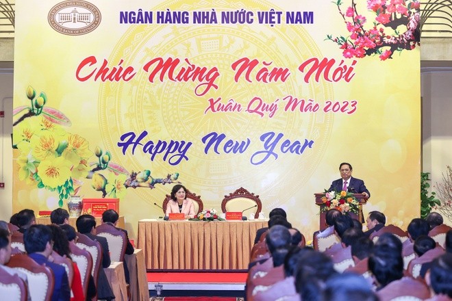 Thủ tướng dự cuộc gặp mặt đầu xuân với ngành ngân hàng.